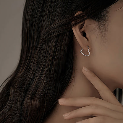 Heart-shaped stainless steel earrings in gold