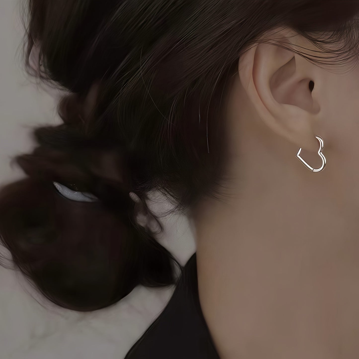 Heart-shaped stainless steel earrings in gold