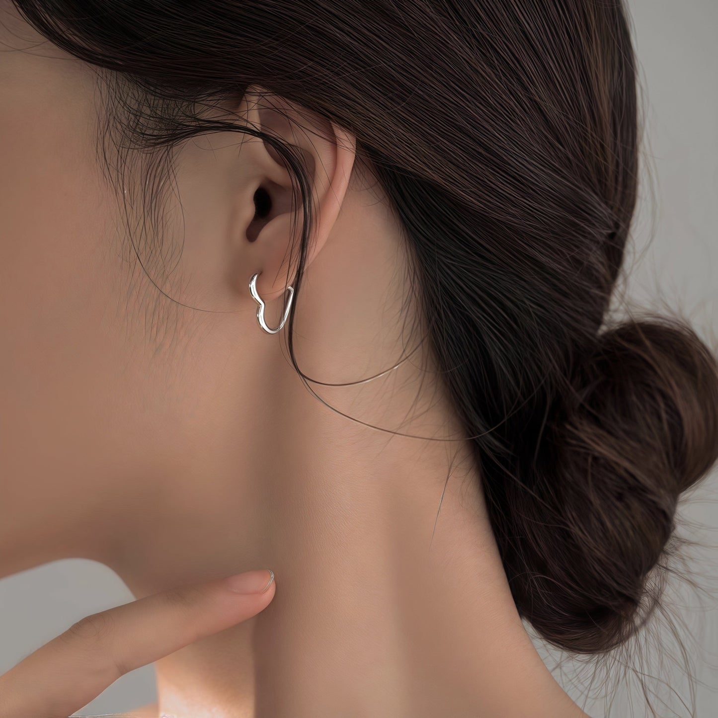 Heart-shaped stainless steel earrings in gold